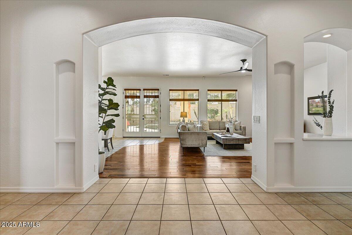 4409 East Janice Way Phoenix, AZ 85032 - Photo 6 of 41 a view of an entryway with wooden floor