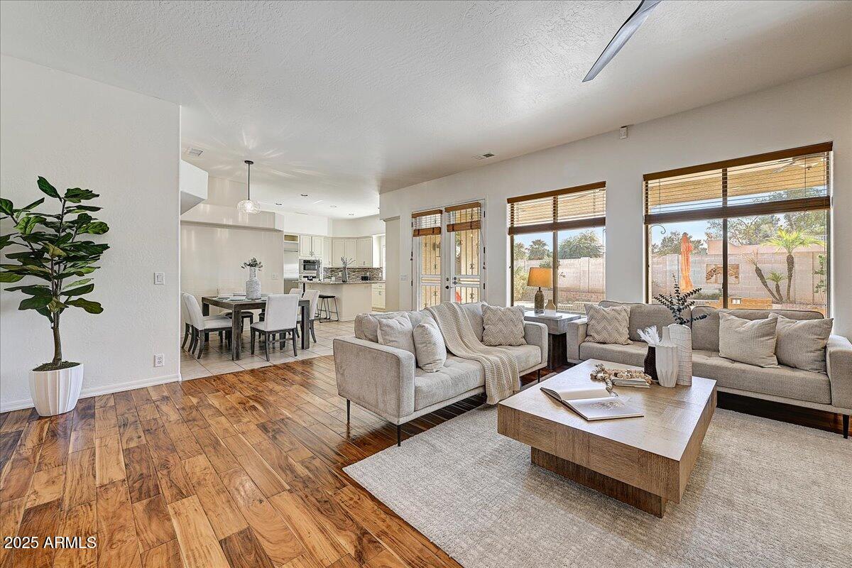 4409 East Janice Way Phoenix, AZ 85032 - Photo 10 of 41 a living room with furniture and a large window