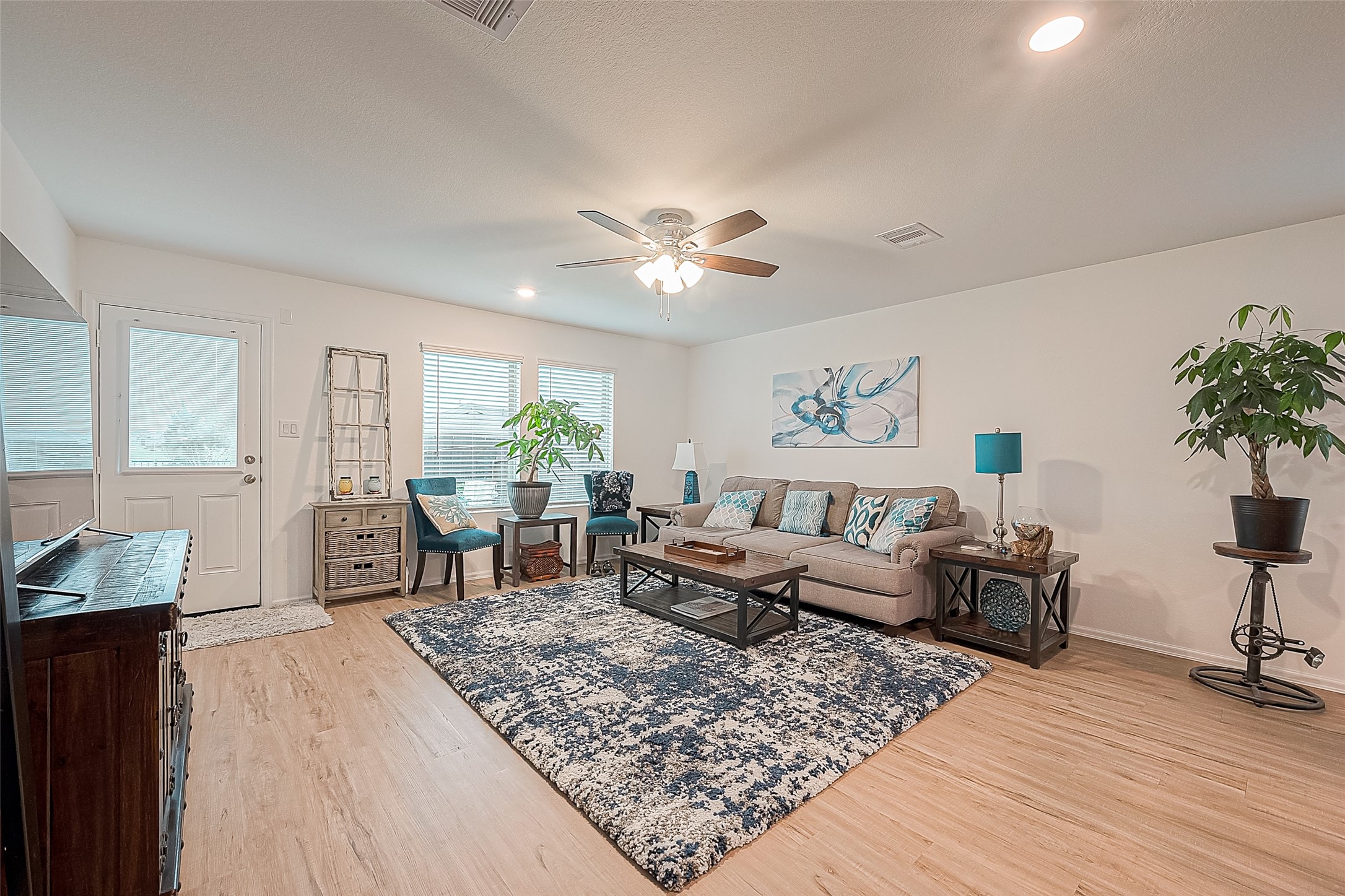 724 Cedar Gate Lane La Marque, TX 77568 - Photo 11 of 40 a living room with furniture and wooden floor