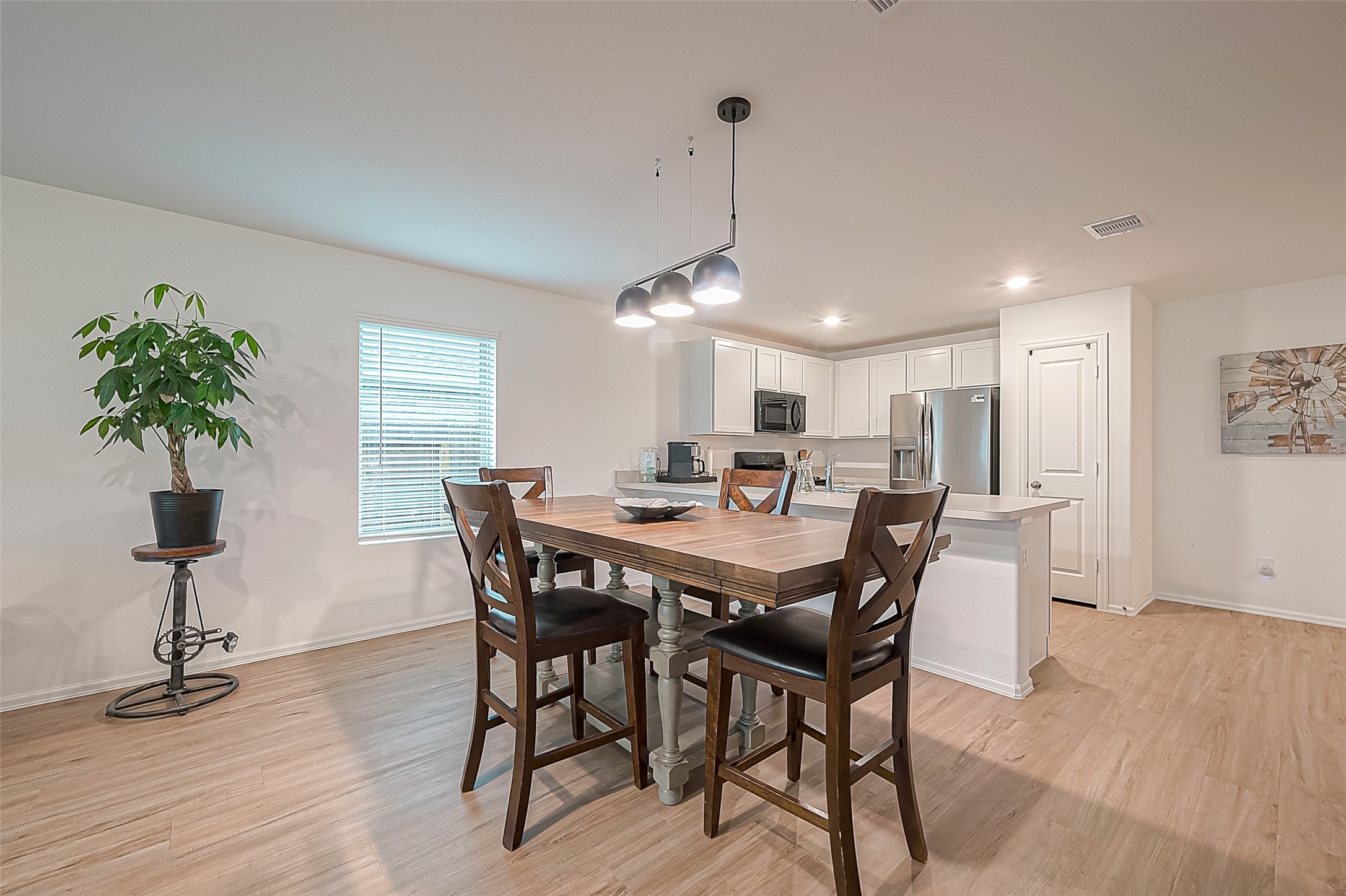 724 Cedar Gate Lane La Marque, TX 77568 - Photo 14 of 40 a view of a dining room with furniture window and wooden floor