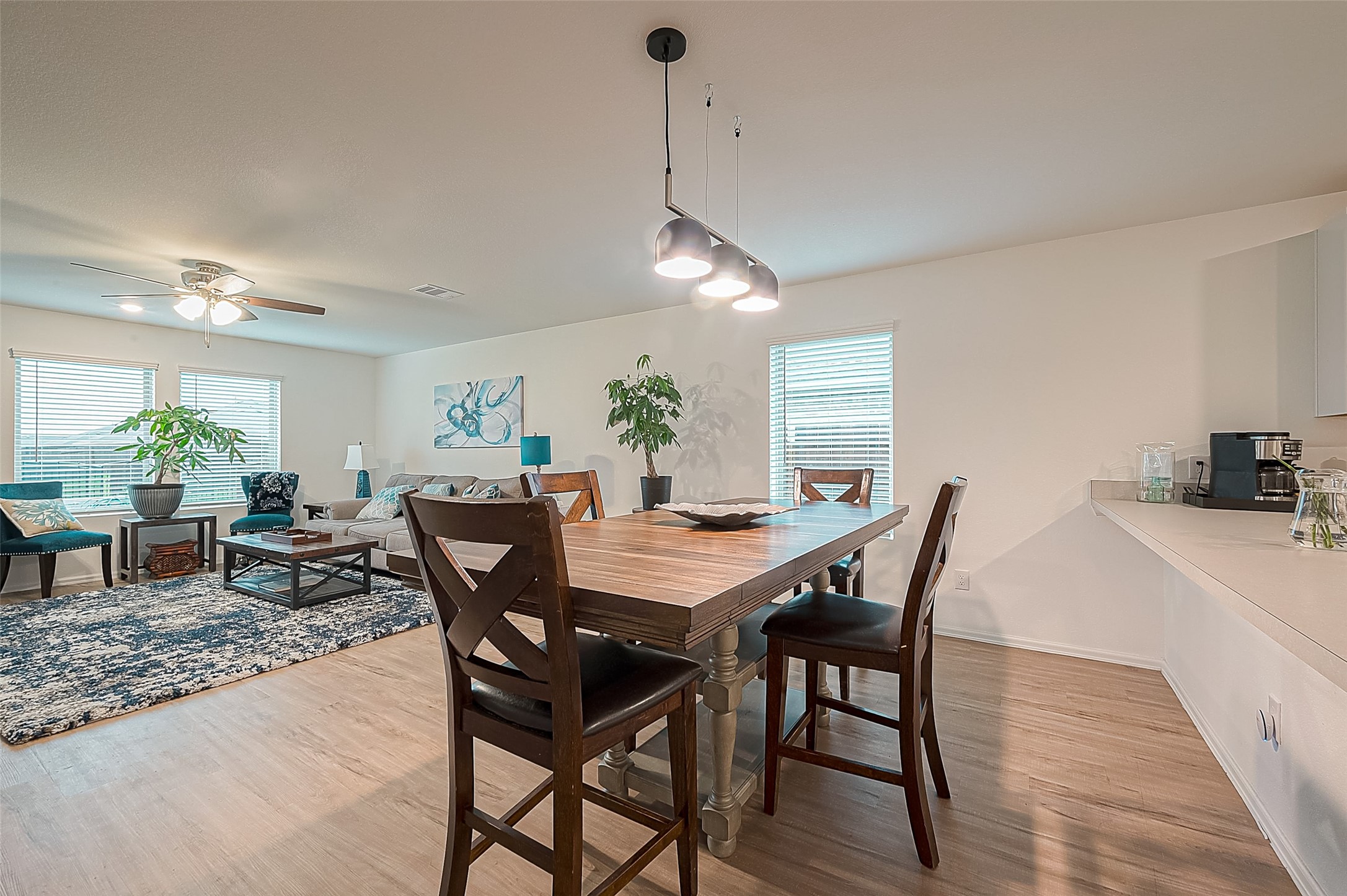 724 Cedar Gate Lane La Marque, TX 77568 - Photo 15 of 40 a view of a dining room with furniture and wooden floor