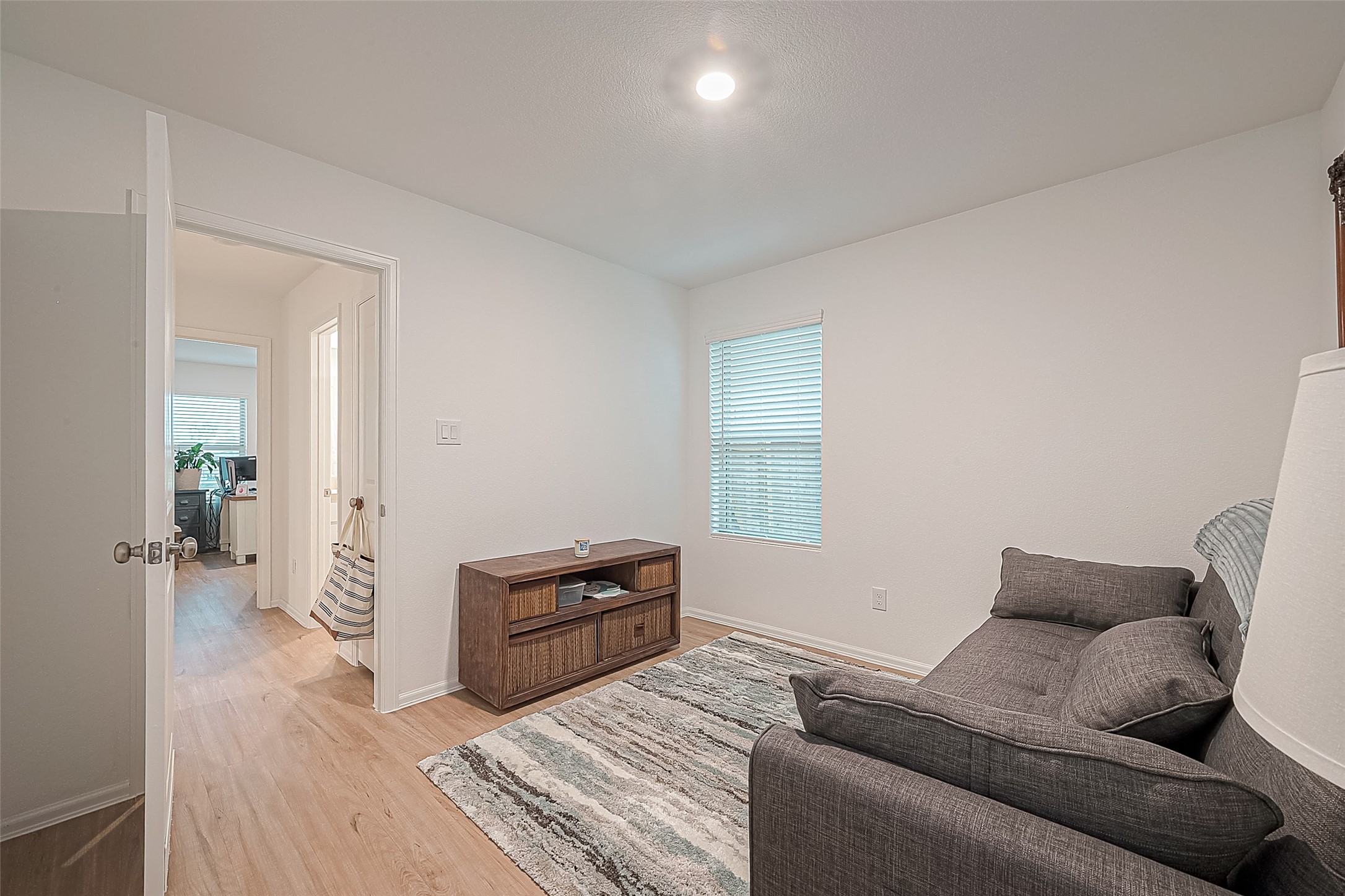 724 Cedar Gate Lane La Marque, TX 77568 - Photo 31 of 40 a living room with furniture and a wooden floor