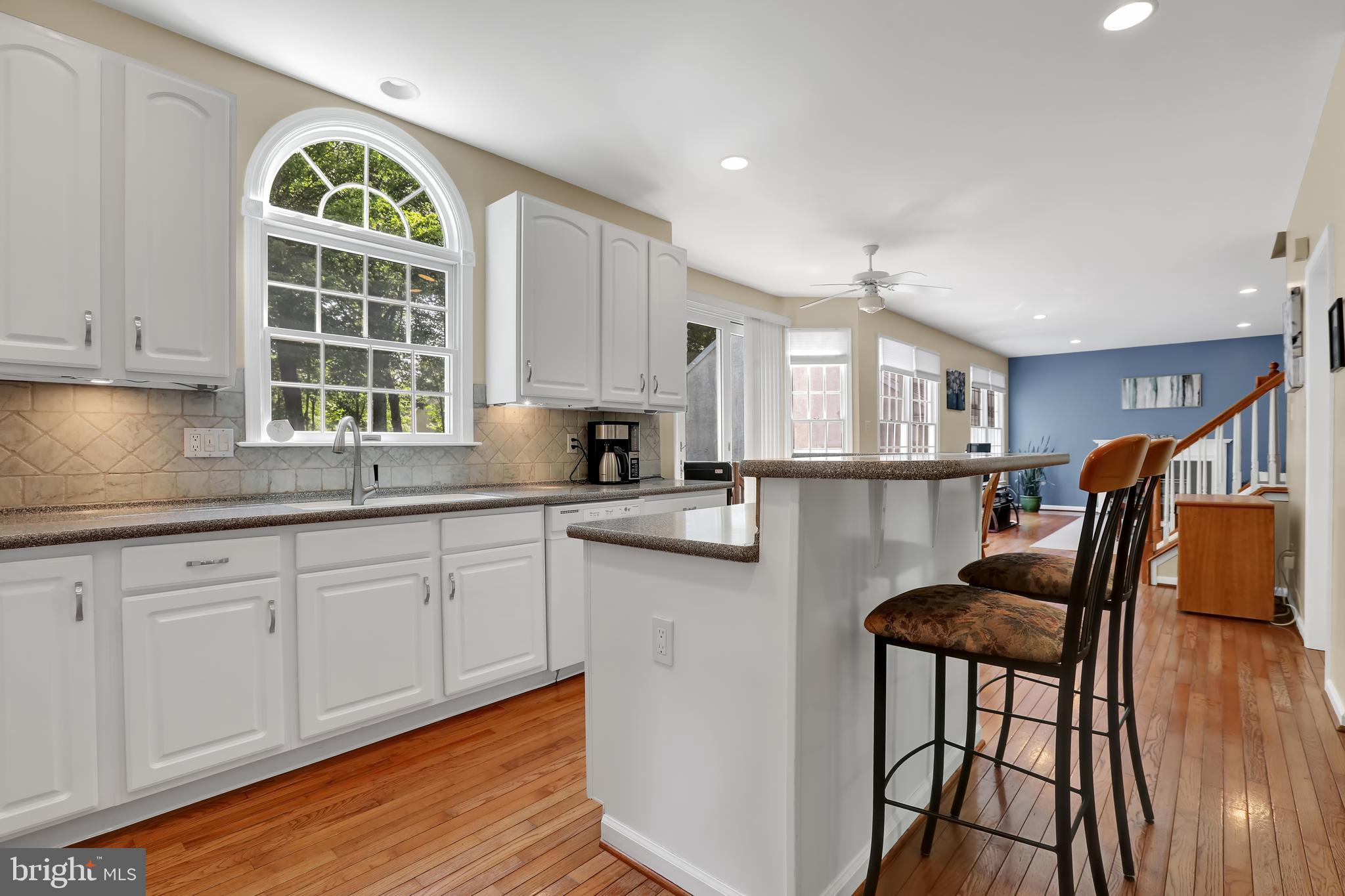 305 West Sandy Ridge Road Doylestown, PA 18901 - Photo 12 of 32 Kitchen with island and seating