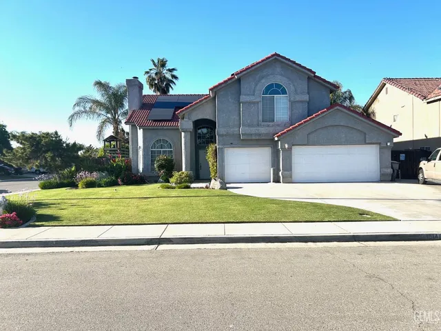 a house view with a garden space