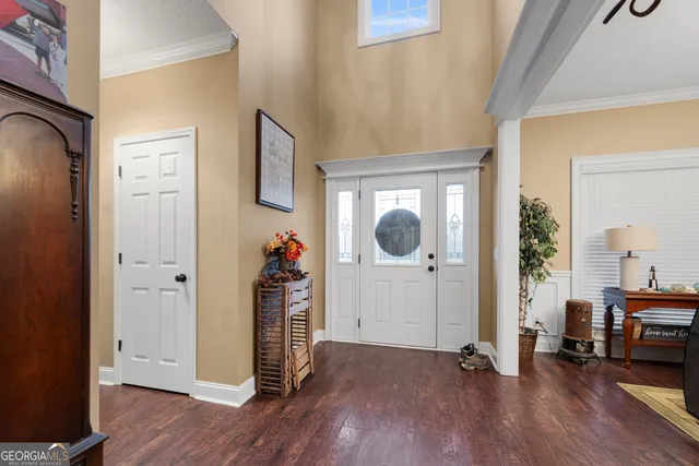 a kitchen that has a sink and a stove in it