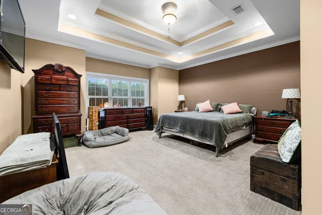 a bathroom with a granite countertop sink toilet and mirror