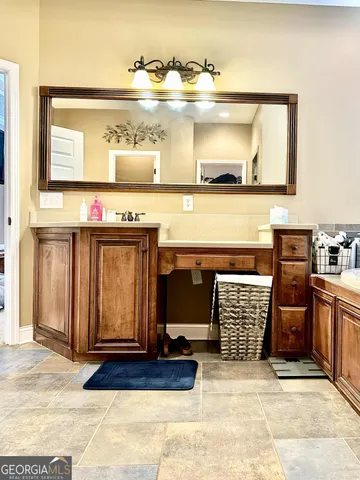 a view of entryway with a front door and wooden floor