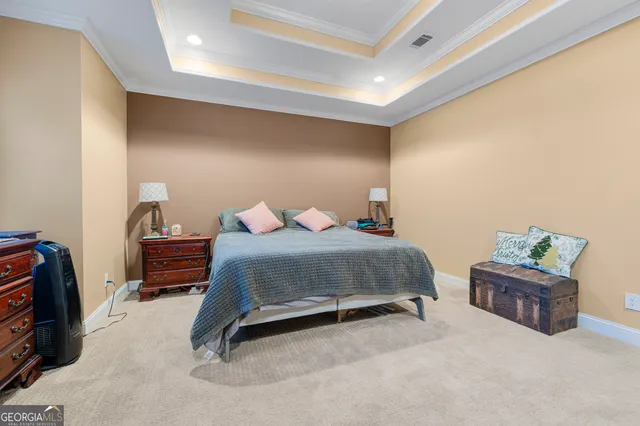 a view of a hallway with wooden floor and closet