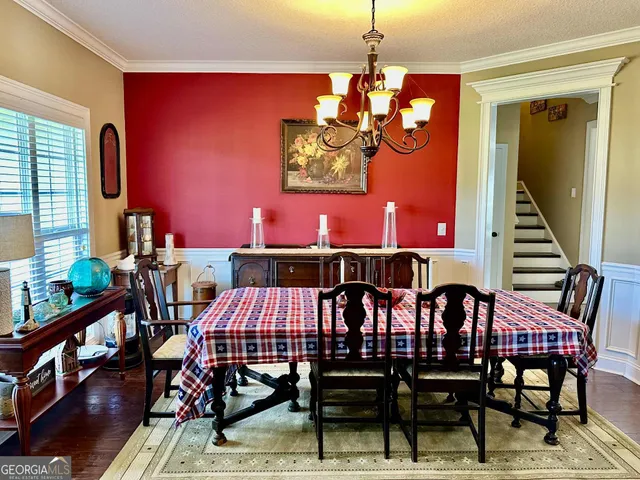 a bedroom with a bed and cabinet
