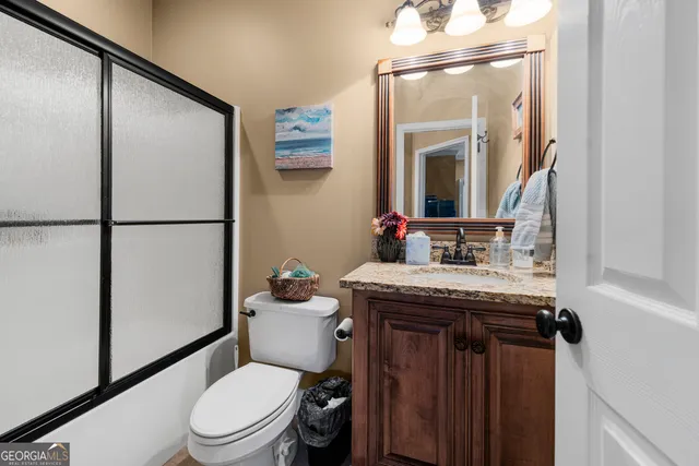 a view of a bedroom with a baby crib