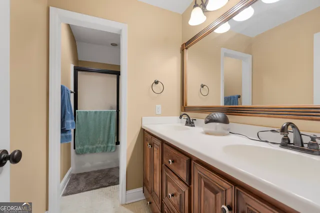 a view of sitting area with furniture and wooden floor