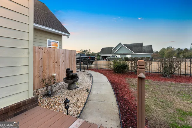 a room with lots of furniture and a large window