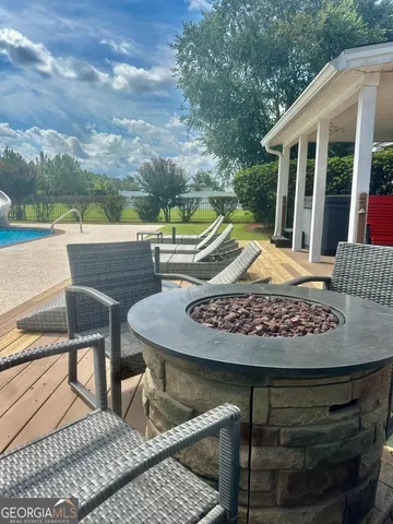 a view of a yard with a tree