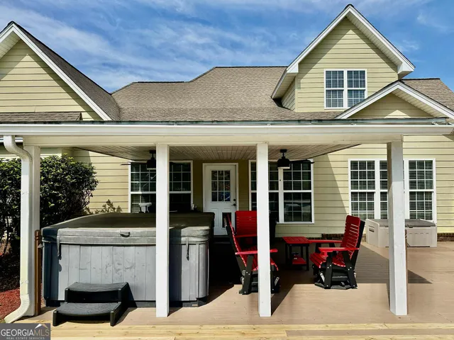 a view of a swimming pool with a lounge chair