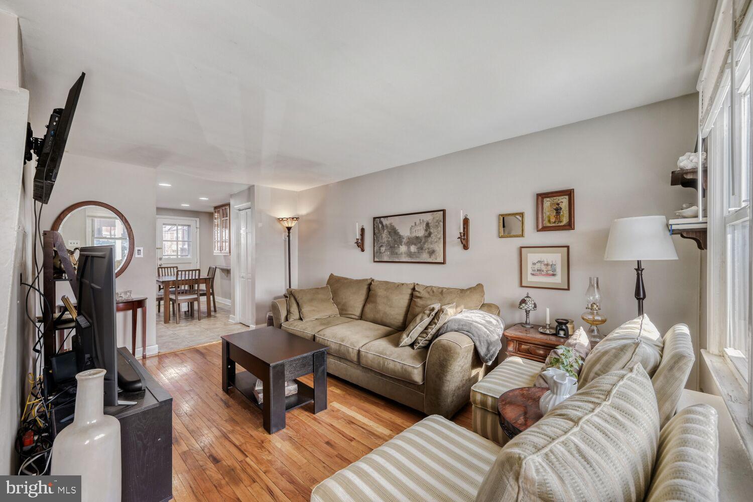 3650 Clarenell Road Baltimore, MD 21229 - Photo 2 of 19 Living room with original wood floors