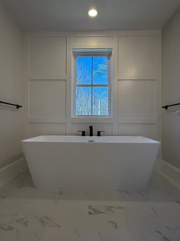 a bathroom with bathtub
