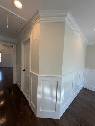 a view of entryway with wooden floor