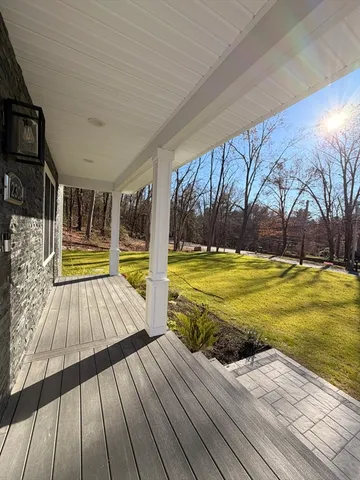 a view of swimming pool with seating space