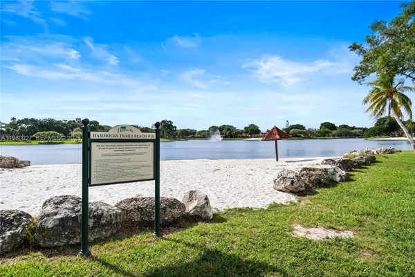 a view of a lake with a big yard