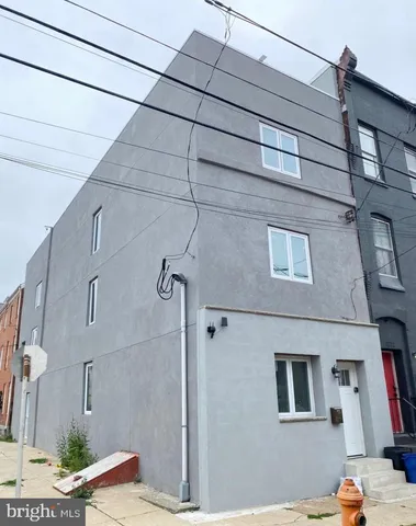 a view of a street with buildings