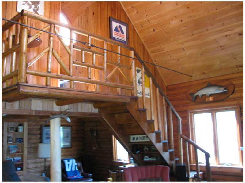 79 Bald Mountain Road Oquossoc, ME 04964 - Photo 8 of 15 Other. Stairs to cabin bunk room.