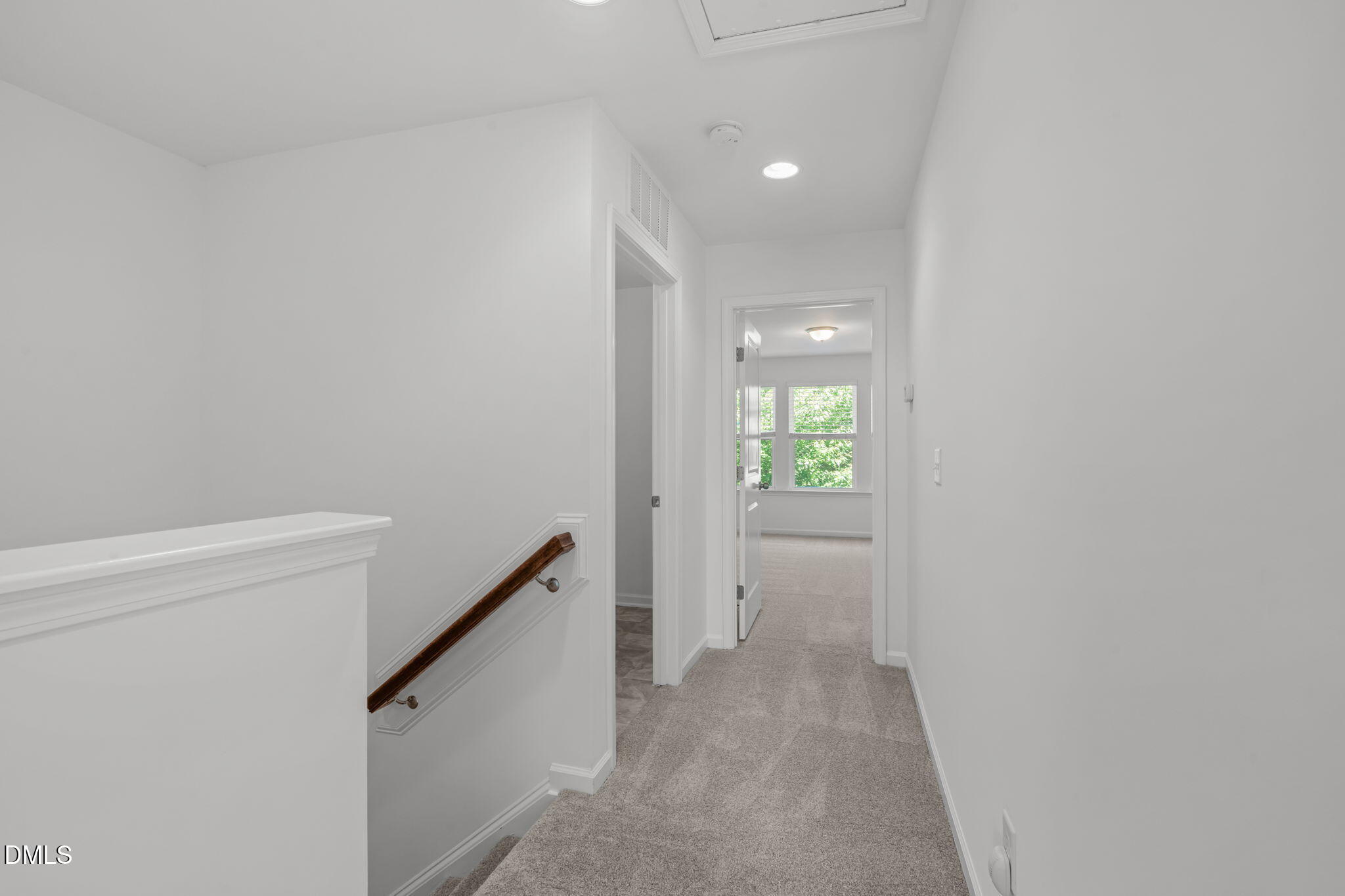 102 Ransomwood Drive Apex, NC 27539 - Photo 15 of 34 a view of hallway with stairs
