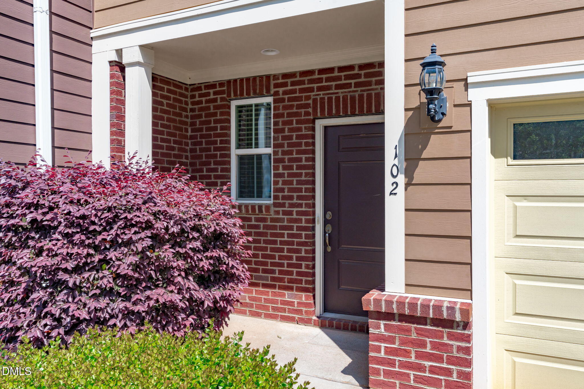 102 Ransomwood Drive Apex, NC 27539 - Photo 2 of 34 a view of front door of house and stairs