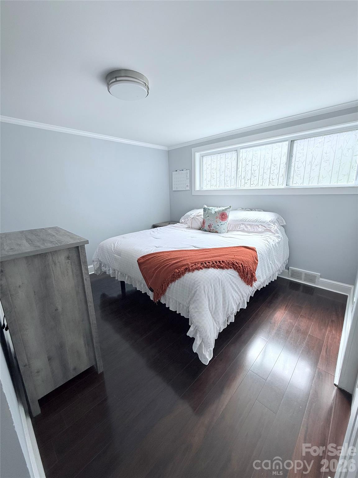 3743 Crosland Road Winston-Salem, NC 27106 - Photo 11 of 25 a bedroom with a bed and window