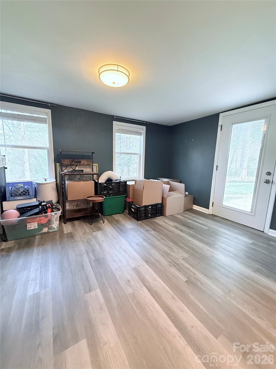 3743 Crosland Road Winston-Salem, NC 27106 - Photo 17 of 25 a bedroom with a bed and wooden floor