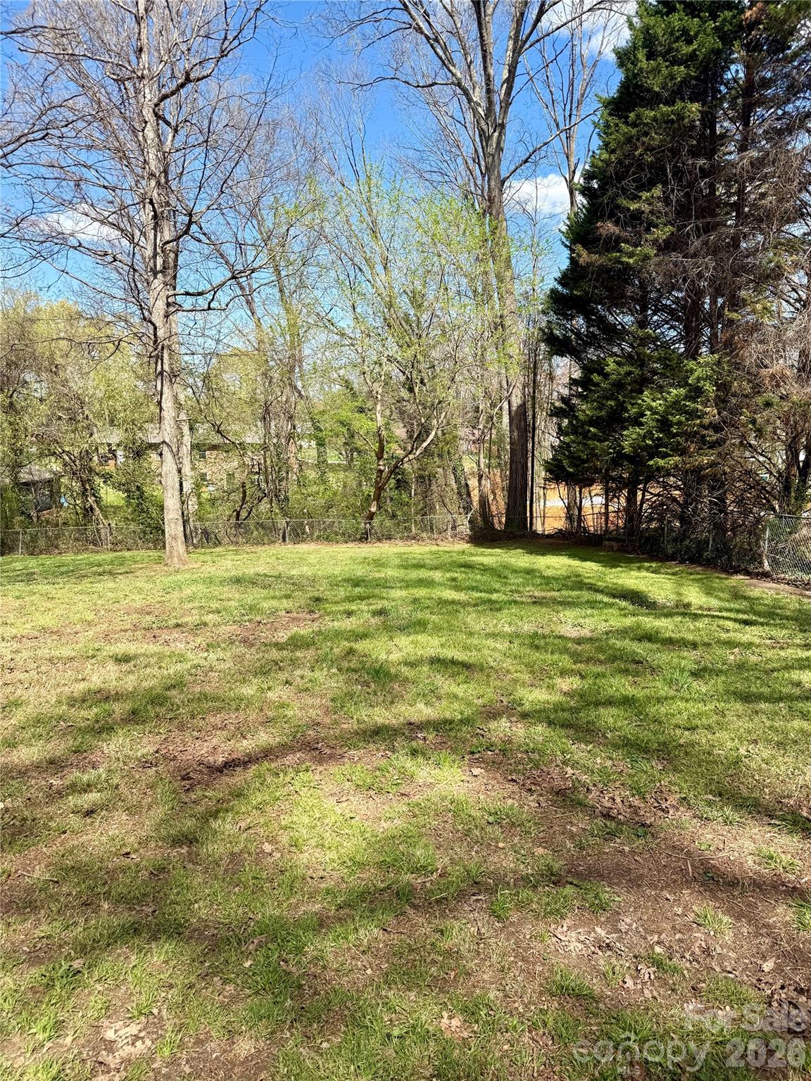 3743 Crosland Road Winston-Salem, NC 27106 - Photo 21 of 25 a view of a field with an trees