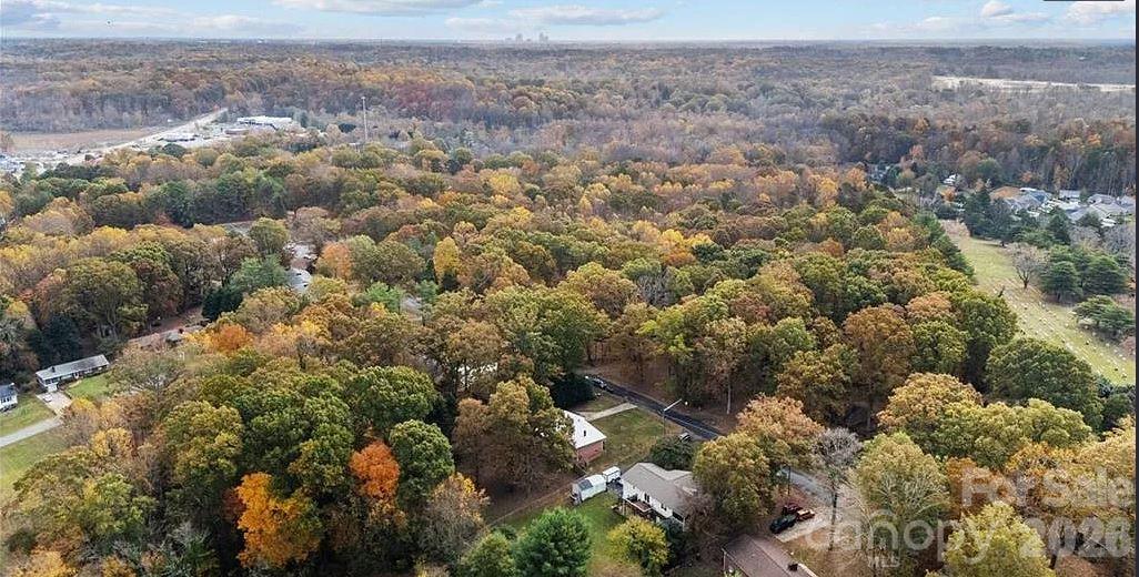 3743 Crosland Road Winston-Salem, NC 27106 - Photo 23 of 25 an aerial view of house with yard and mountain view in back