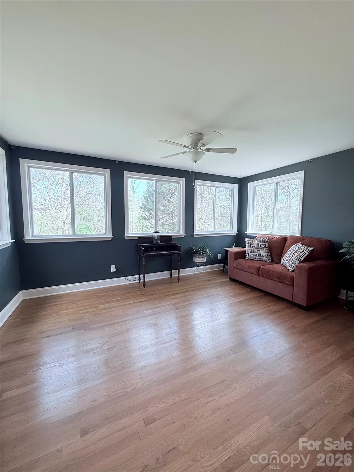 3743 Crosland Road Winston-Salem, NC 27106 - Photo 5 of 25 a living room with furniture and a large window
