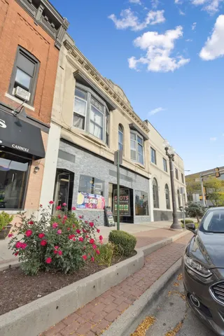 a view of a building with a street