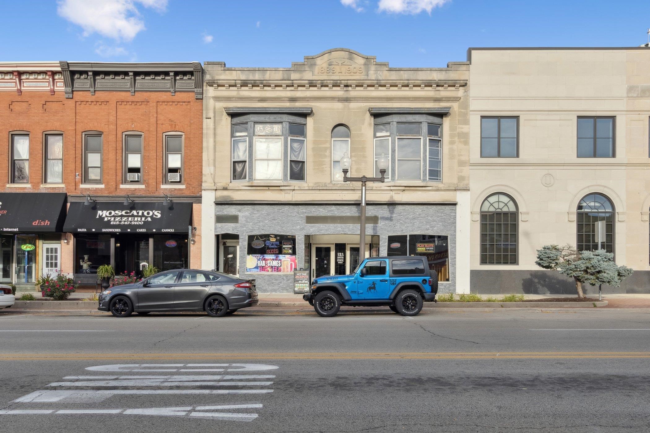 522 South State Street Belvidere, IL 61008 - Photo 4 of 67 a building with car parked in front of it
