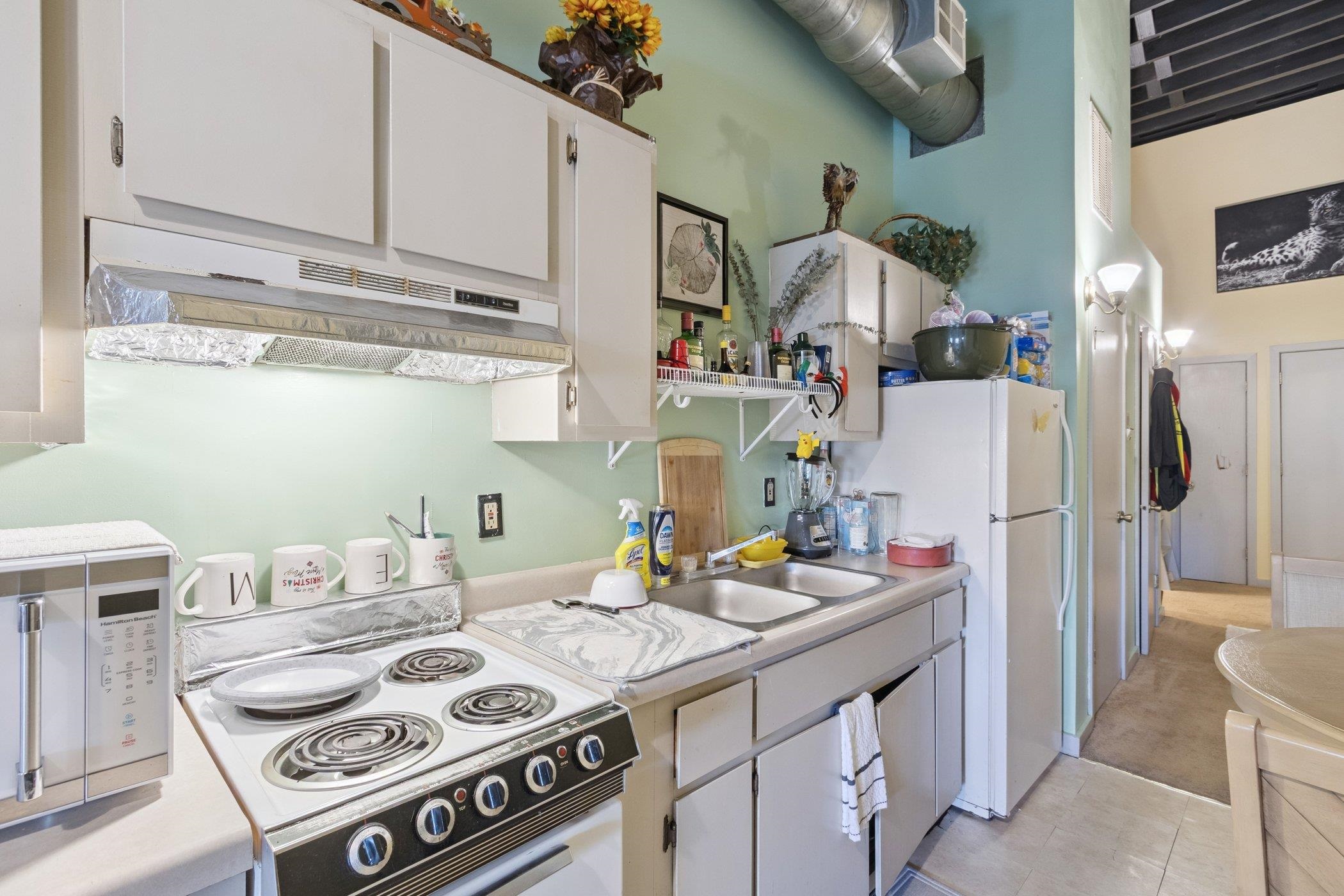 522 South State Street Belvidere, IL 61008 - Photo 41 of 67 a kitchen with a sink stove and cabinets