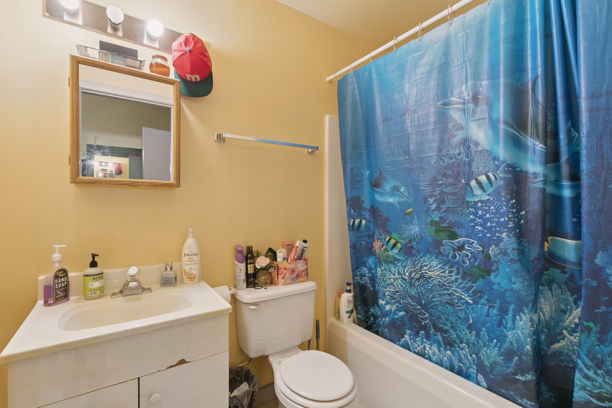 522 South State Street Belvidere, IL 61008 - Photo 50 of 67 a bathroom with a toilet sink and shower