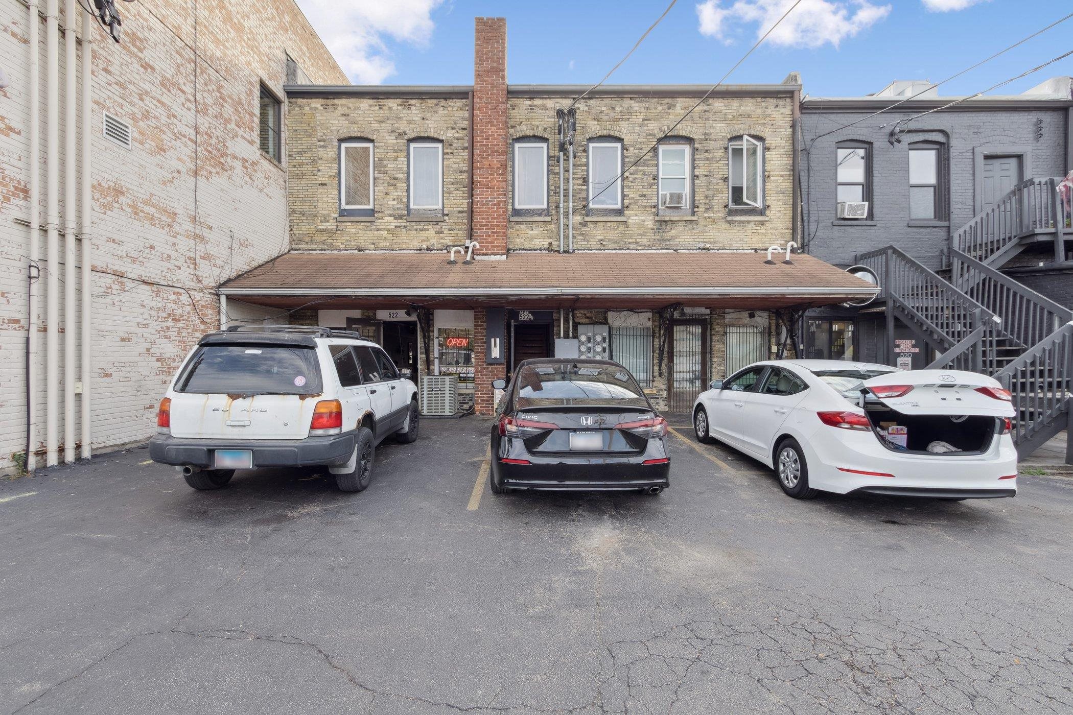 522 South State Street Belvidere, IL 61008 - Photo 52 of 67 a car parked in front of a brick house