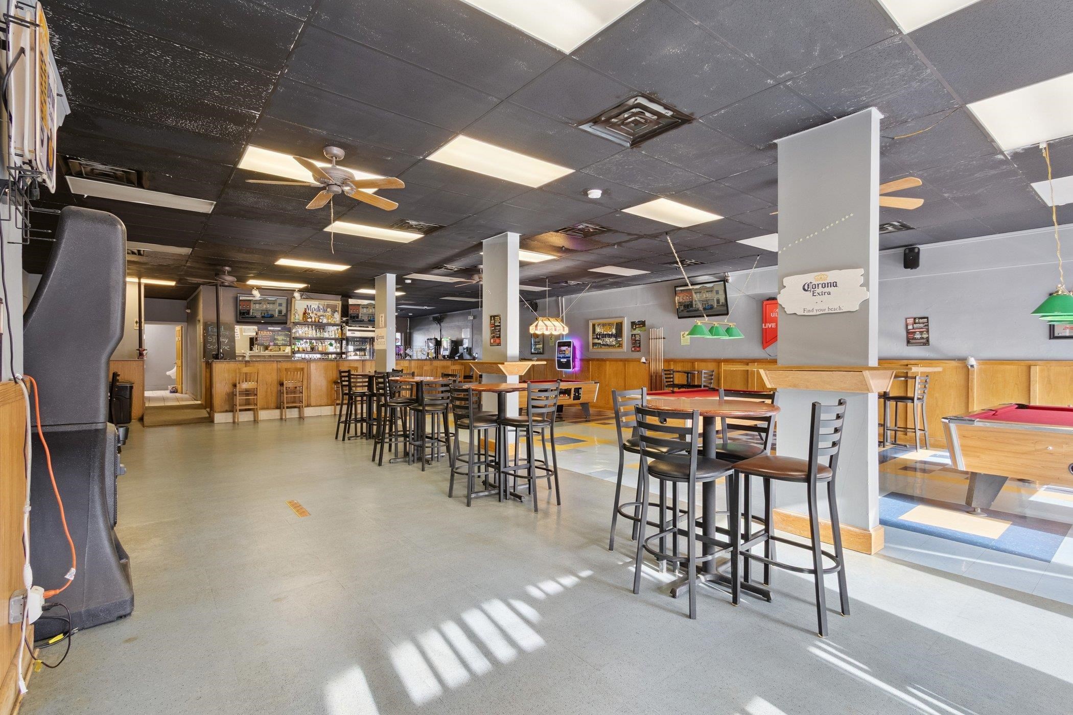 522 South State Street Belvidere, IL 61008 - Photo 10 of 67 a dining room with lots of furniture and chandelier