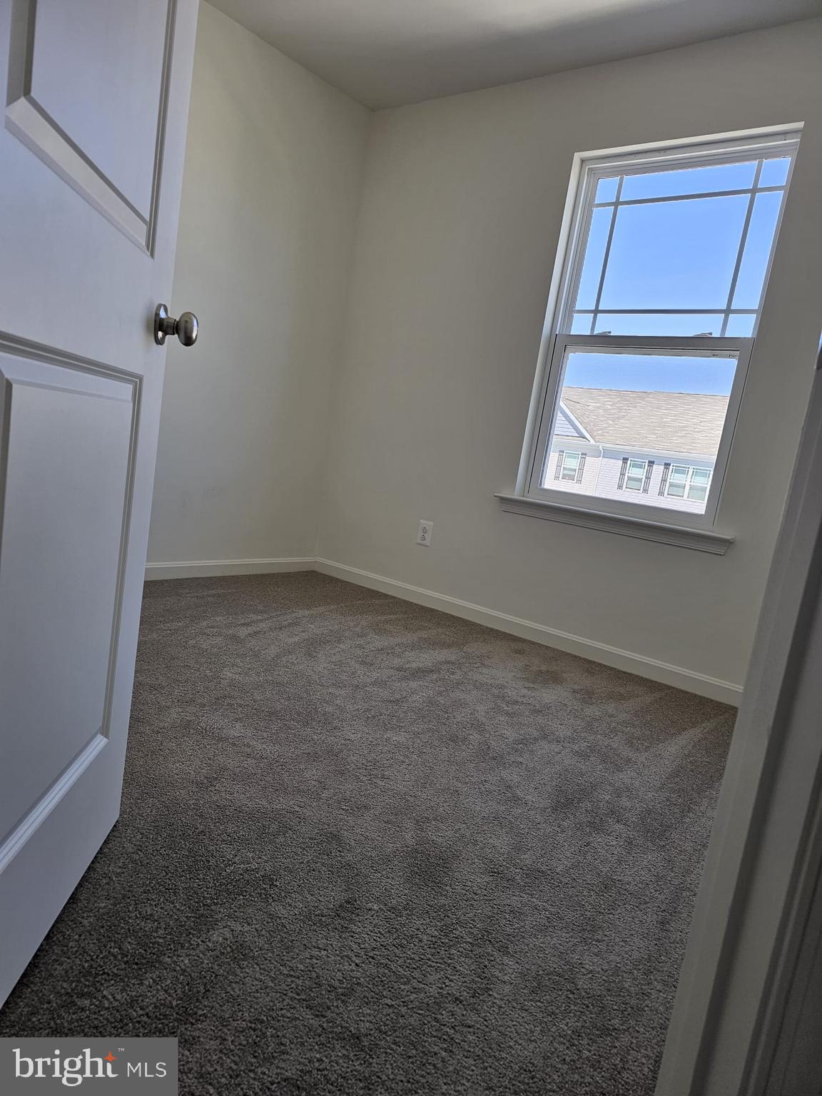 2506 Boeing Way Cambridge, MD 21613 - Photo 14 of 19 an empty room with a window