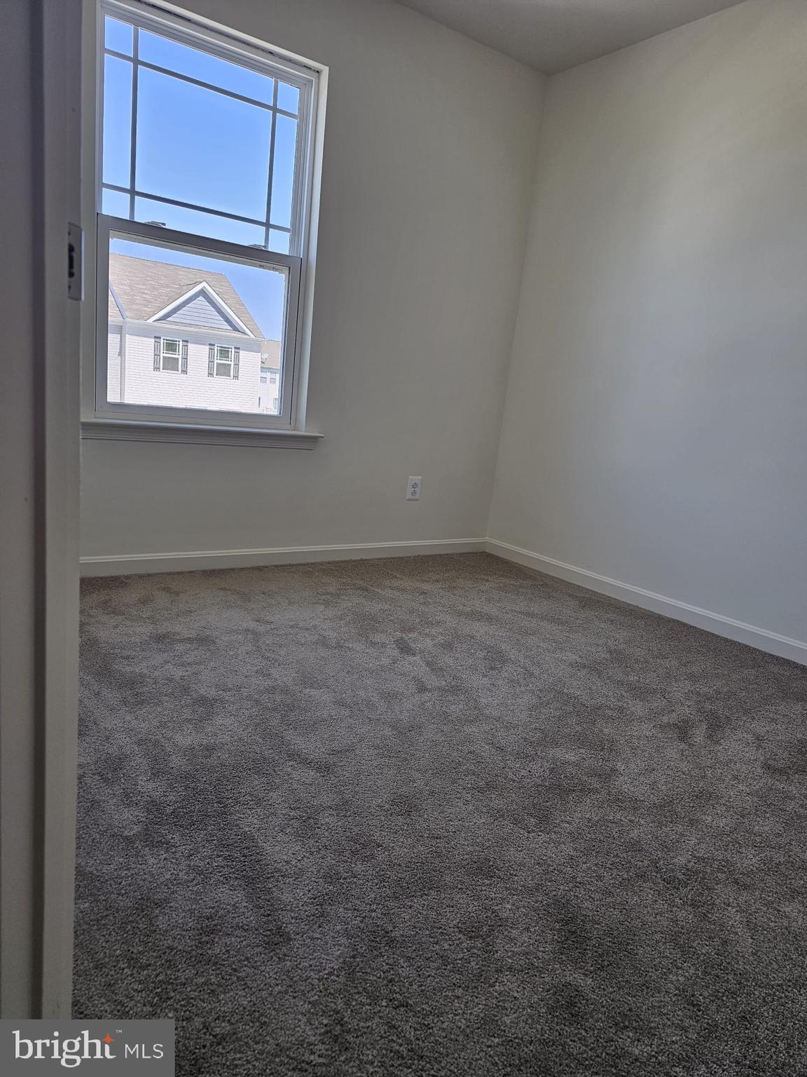 2506 Boeing Way Cambridge, MD 21613 - Photo 15 of 19 an empty room with a window