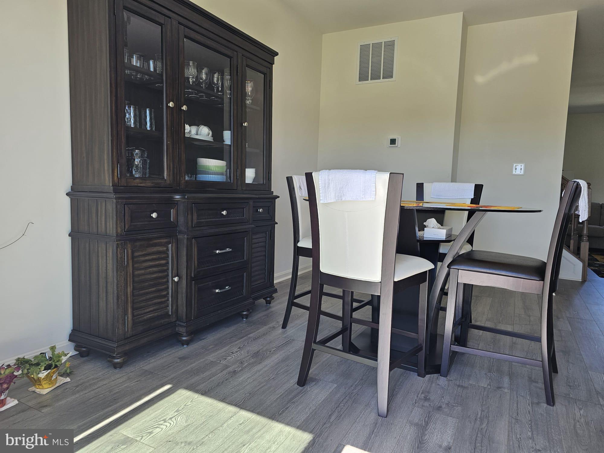 2506 Boeing Way Cambridge, MD 21613 - Photo 4 of 19 a view of a dining room with furniture