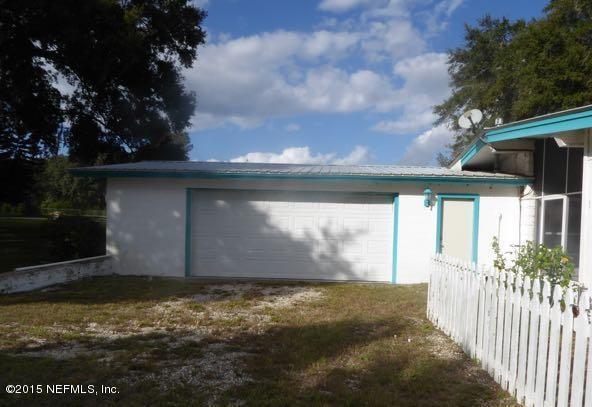 126 Pique Road Crescent City, FL 32112 - Photo 12 of 20 a view of back yard of the house