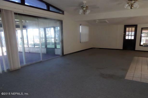 126 Pique Road Crescent City, FL 32112 - Photo 15 of 20 a view of an empty room with window