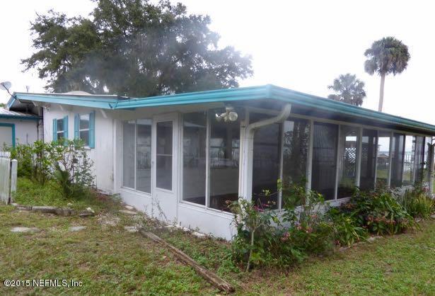 126 Pique Road Crescent City, FL 32112 - Photo 3 of 20 front view of house with a yard