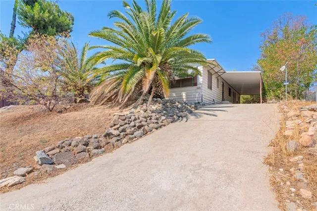 a view of a backyard of a house