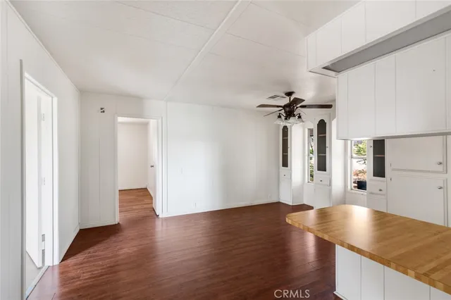 a view of a kitchen with a sink and dishwasher