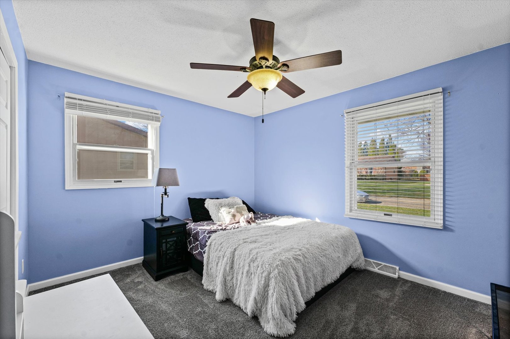 203 Valley Road Monticello, IL 61856 - Photo 16 of 25 a bedroom with a bed and window