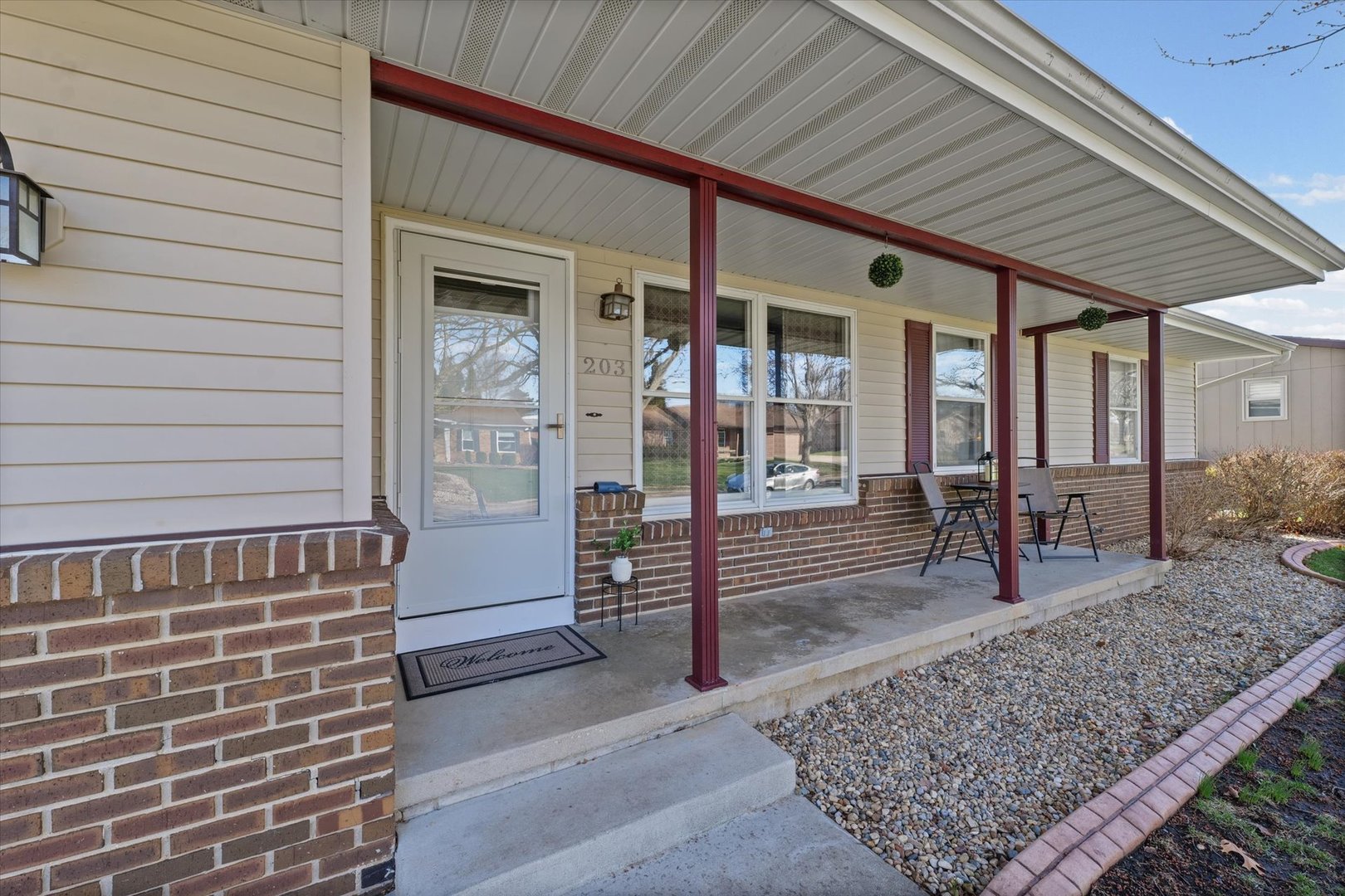 203 Valley Road Monticello, IL 61856 - Photo 2 of 25 a view of a house with a patio