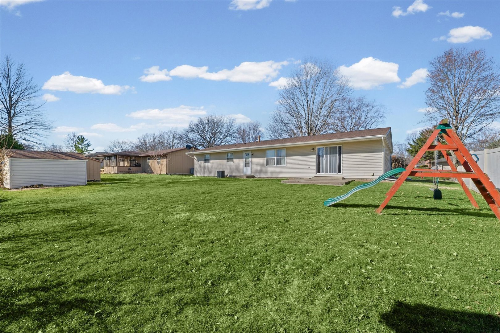 203 Valley Road Monticello, IL 61856 - Photo 24 of 25 a view of an house with backyard space and porch