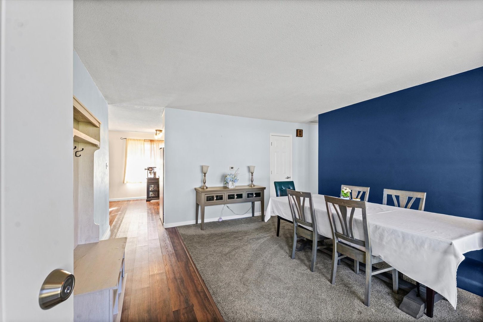 203 Valley Road Monticello, IL 61856 - Photo 3 of 25 a living room with furniture and a wooden floor